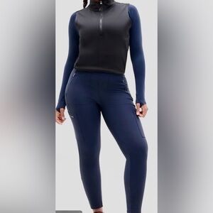 ATHLETA WOMENS   
PEAK HYBRID FLEECE TIGHT
SIZE LARGE
COLOR NAVY
